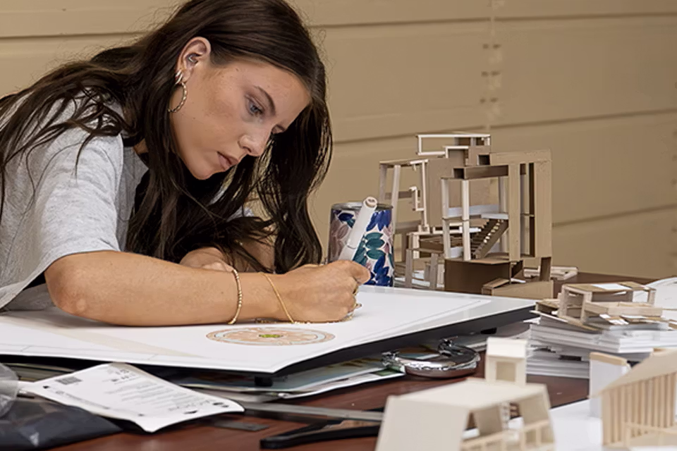 architecture student designing