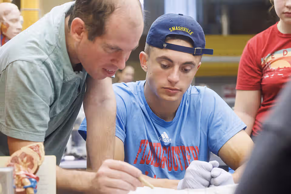 Students and teacher in a science lab