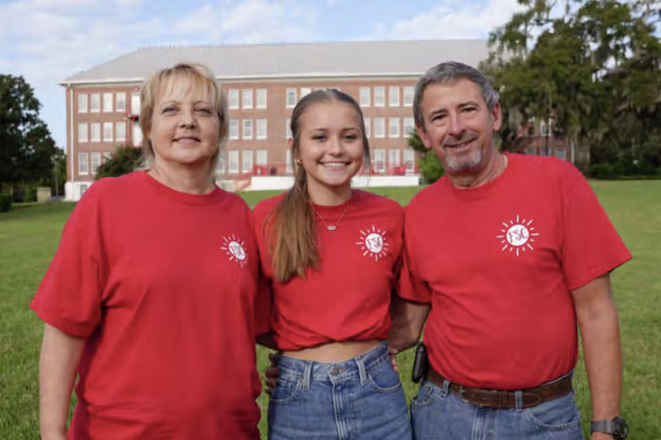 parents and student at Family Weekend
