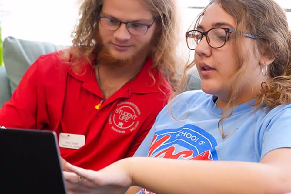 Success Coach working with student
