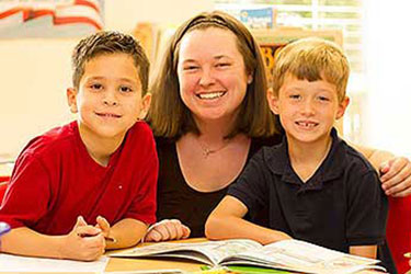 Roberts Academy teacher with students
