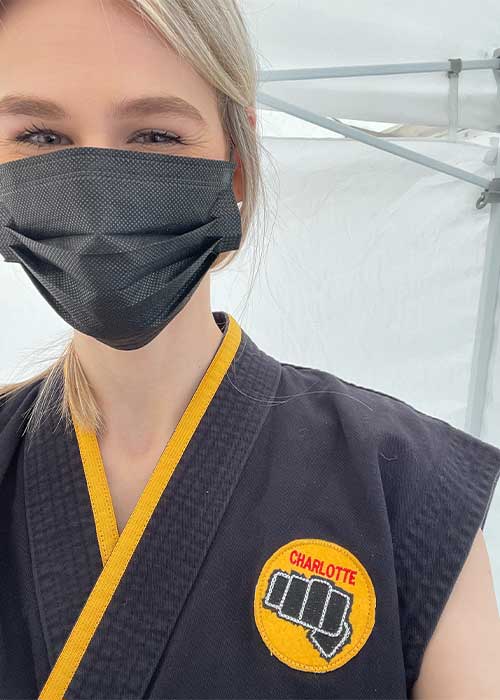 Phoebe in costume for Cobra Kai. Phoebe in costume for Cobra Kai.
