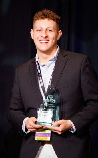 Jimmy Houle holding Award