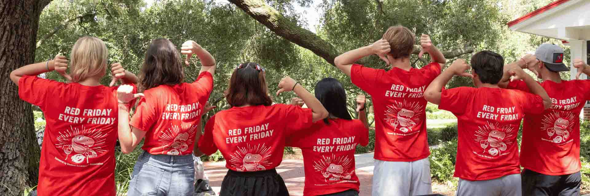 Students wearing Red Friday Everyday T-shirts