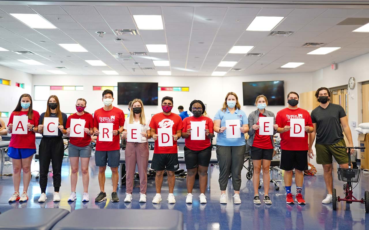 physical therapy students spell out accredited