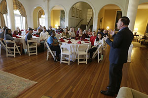 Dr. Jeff Grove talking to the Department of Theatre and Dance students and faculty in Eleanor Searle Drawing room.