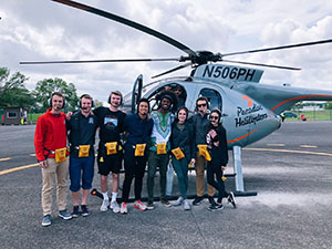 FSC Students in front of the helicopter.