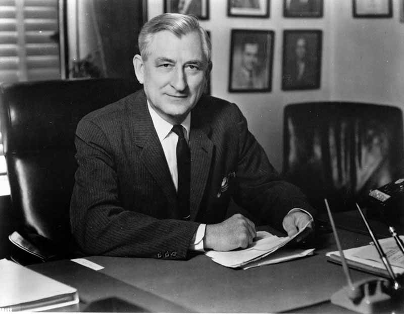 Portrait of James A. Haley sitting at his desk