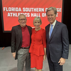 Florida Southern College President Dr. Anne B. Kerr with the 2023 FSC Athletics Hall of Fame keynote speaker, Mr. Fred Ridley (right), and Class of 2011 Hall of Fame Inductee and Trustee Mr. Bob Adams