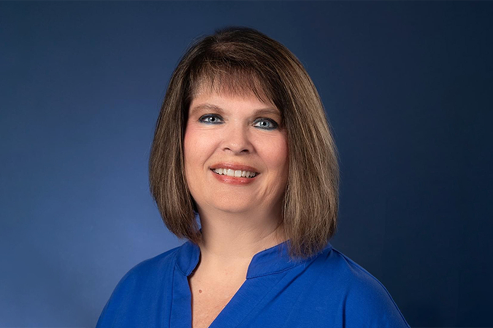 Headshot of Dean Lori Rakes.