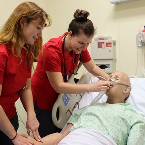 Nursing Students practicing patient care