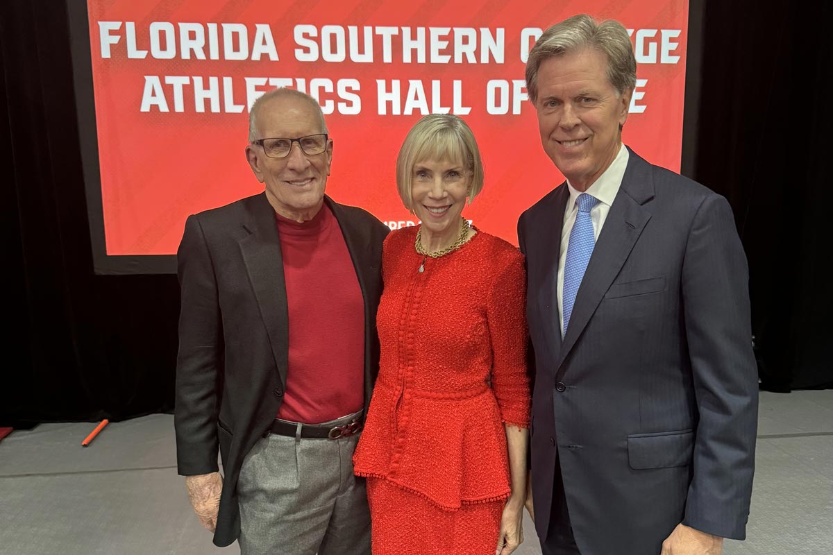Florida Southern College President Dr. Anne B. Kerr with the 2023 FSC Athletics Hall of Fame keynote speaker, Mr. Fred Ridley (right), and Class of 2011 Hall of Fame Inductee and Trustee Mr. Bob Adams