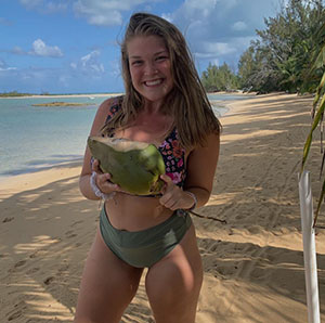 Mckayla '21 with a coconut.