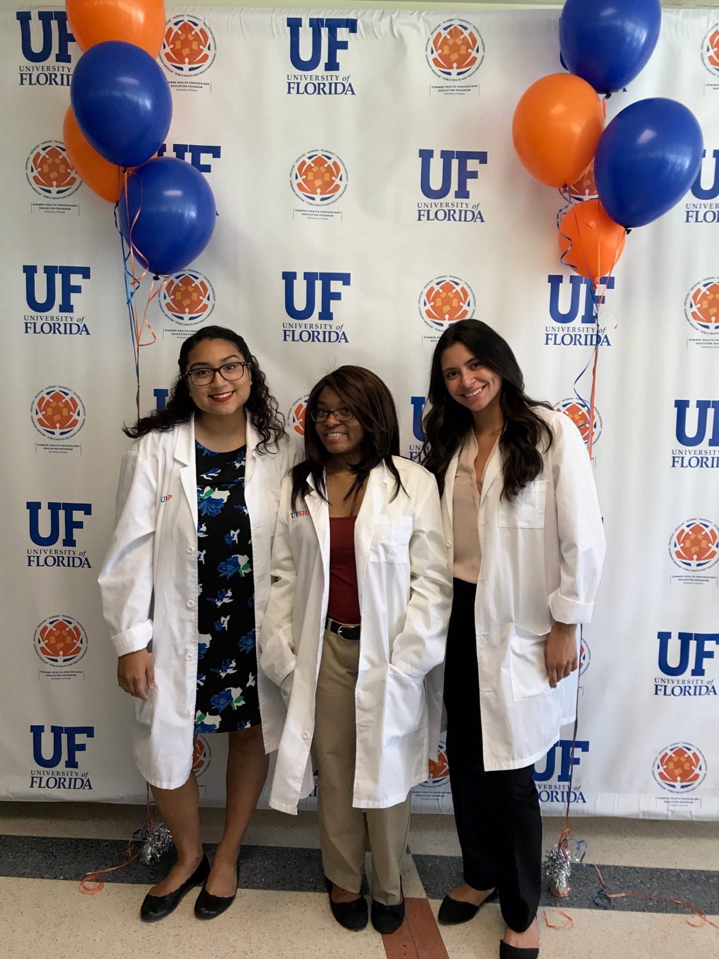 Three female students participating in the SHPEP at the University of Florida.