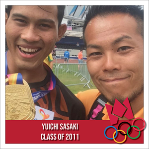 Yuichi Sasaki holding a gold Olympic medal