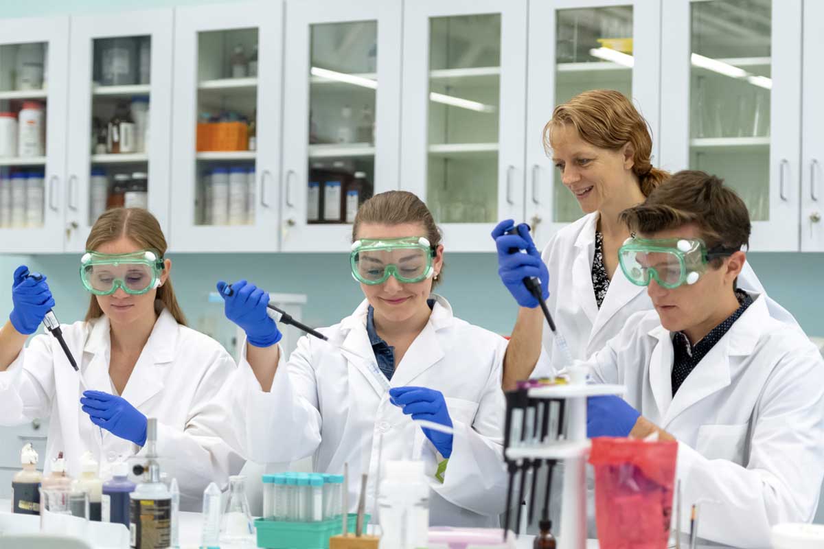 Dr. Morvillo in lab with students