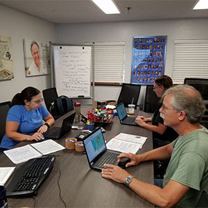 From left to right: Professor Daugherty, Dr. Wolovich and Dr. Kjellmark exploring the uses of GIS technology at the Sea Grant UF training program.