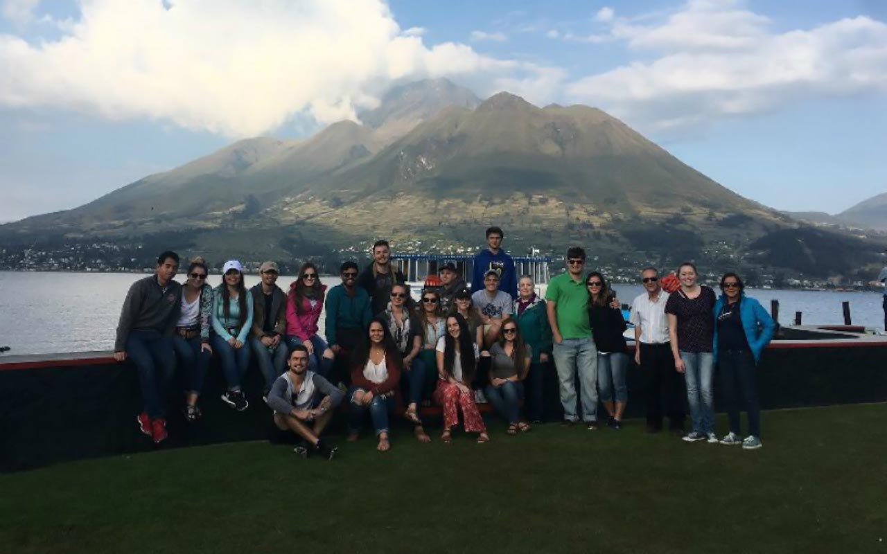 Group of students enjoying a breathtaking mountain view during their Ecuador Junior Journey trip.