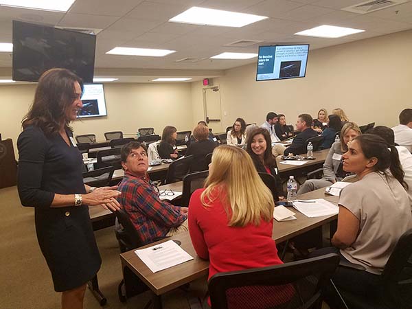 Circuit Judge Caroline Shepherd interacts with attorneys and judges attending the 15th Circuit Justice Teaching training held at the Palm Beach County Bar Association.